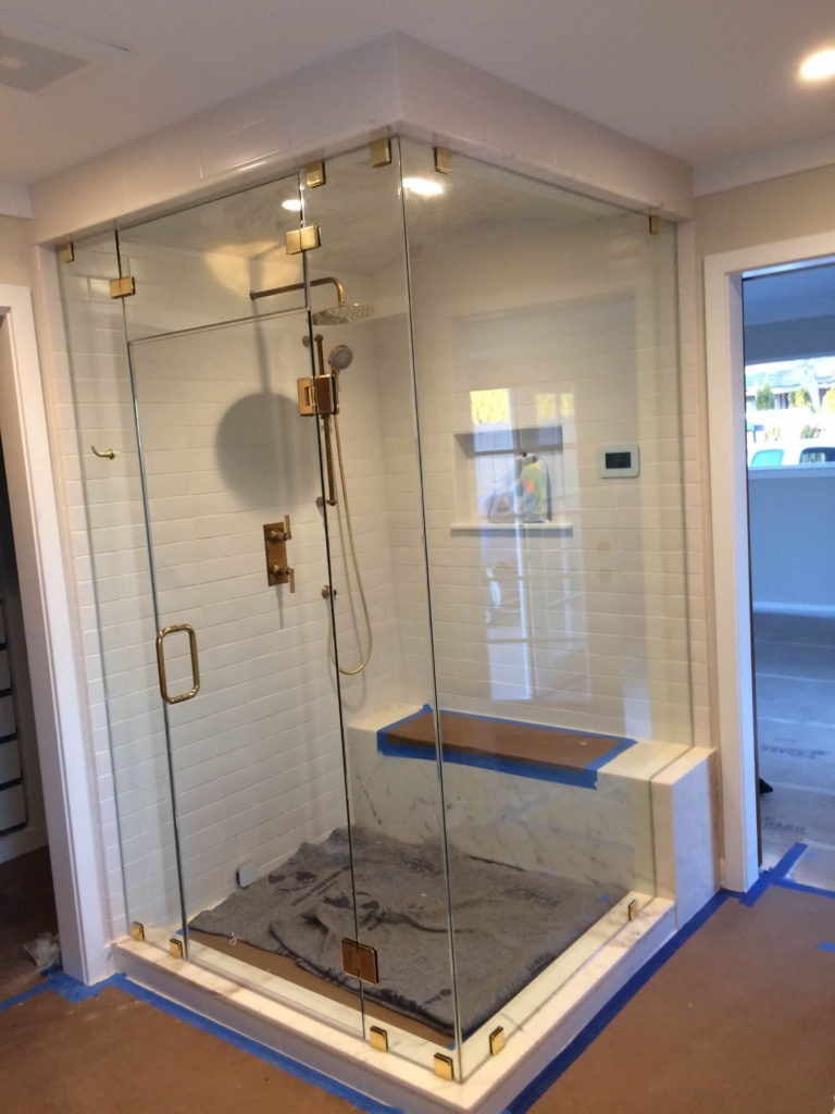 Frameless Steam Shower with Polished Gold Hardware January 2019